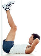 Man performs ab crunch.