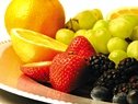 Plate full of fruit.