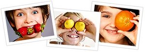 Girl holding orange up to her eye.