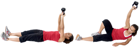  	Personal trainer Chelsea Cooper domonstrates a Turkish Get-Up with a Kettlebell.