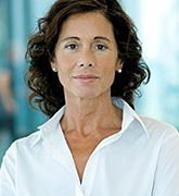A close-up of a middle aged woman.