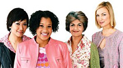 Women of different races standing in a group.