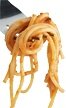 A fork with pasat noodles wrapped around the tines.
