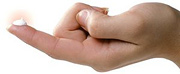 Finger with dollop of topical analgesic on the tip.