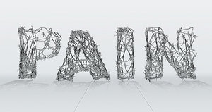 The word pain spelled out with barbed wire.