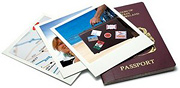 A pile of poloroid pictures and a passport.