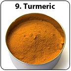 A tin bowl full of turmeric.